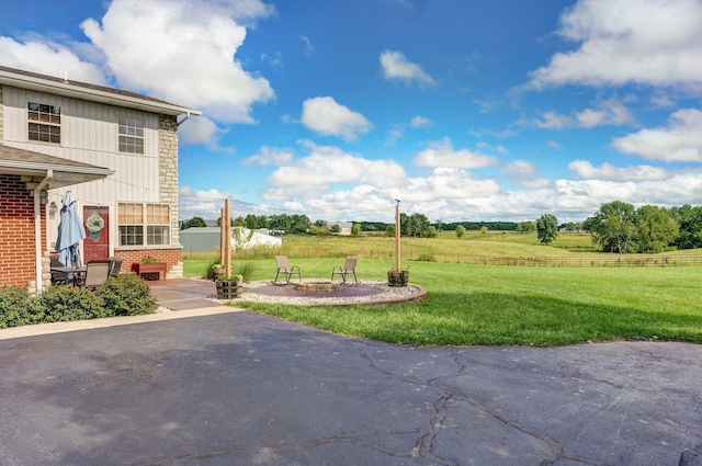 2526 State Highway B, Rogersville, MO 65742 - view of yard with a patio area and an outdoor fire pit