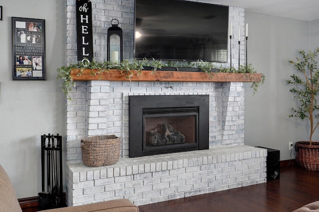 2526 State Highway B, Rogersville, MO 65742 - detailed view of a brick fireplace, wood finished floors, and baseboards