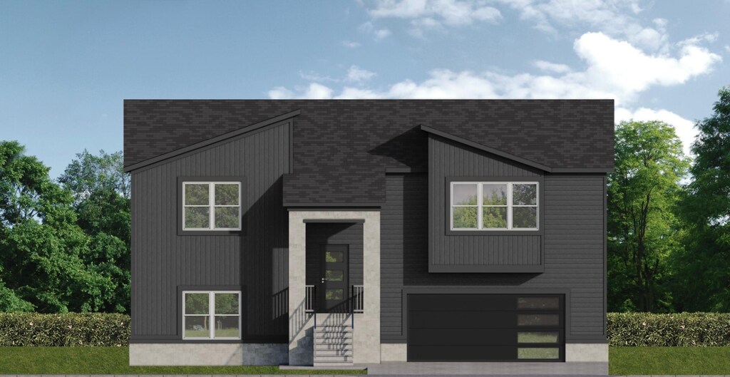2509 W Pigeon Dr, Ozark, MO 65721 - view of front facade featuring an attached garage, roof with shingles, and driveway