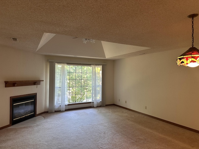 154A Scofield Ave, Forsyth, MO 65653 - unfurnished living room with carpet floors, a fireplace with flush hearth, a textured ceiling, and baseboards