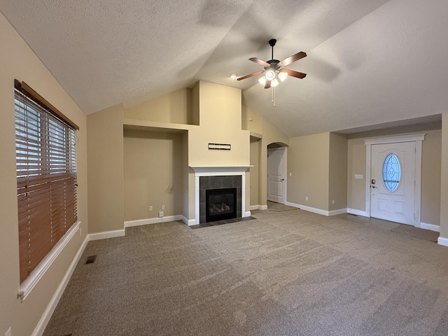 895 W Linwood Ave, Nixa, MO 65714 - unfurnished living room with ceiling fan, a fireplace, carpet floors, lofted ceiling, and baseboards