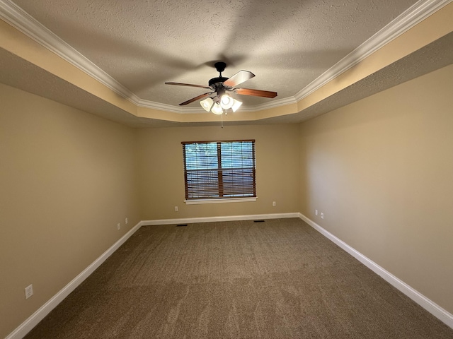 895 W Linwood Ave, Nixa, MO 65714 - spare room with crown molding, a raised ceiling, ceiling fan, a textured ceiling, and dark carpet