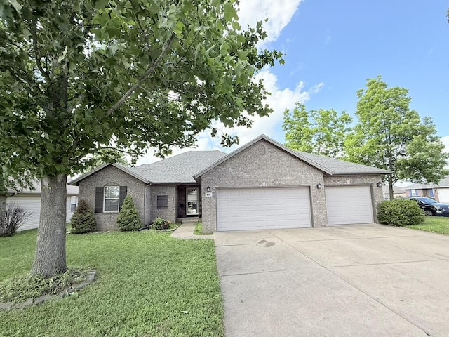 895 W Linwood Ave, Nixa, MO 65714 - single story home featuring an attached garage, driveway, a front lawn, and brick siding