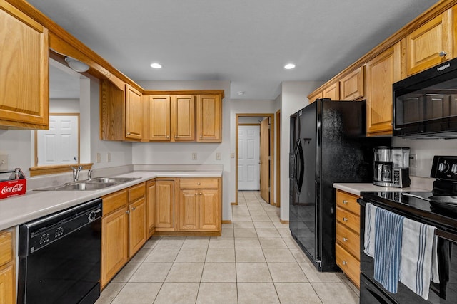 1382 S Kristopher Ave, Republic, MO 65738 - kitchen featuring black appliances, a sink, light countertops, light tile patterned flooring, and recessed lighting