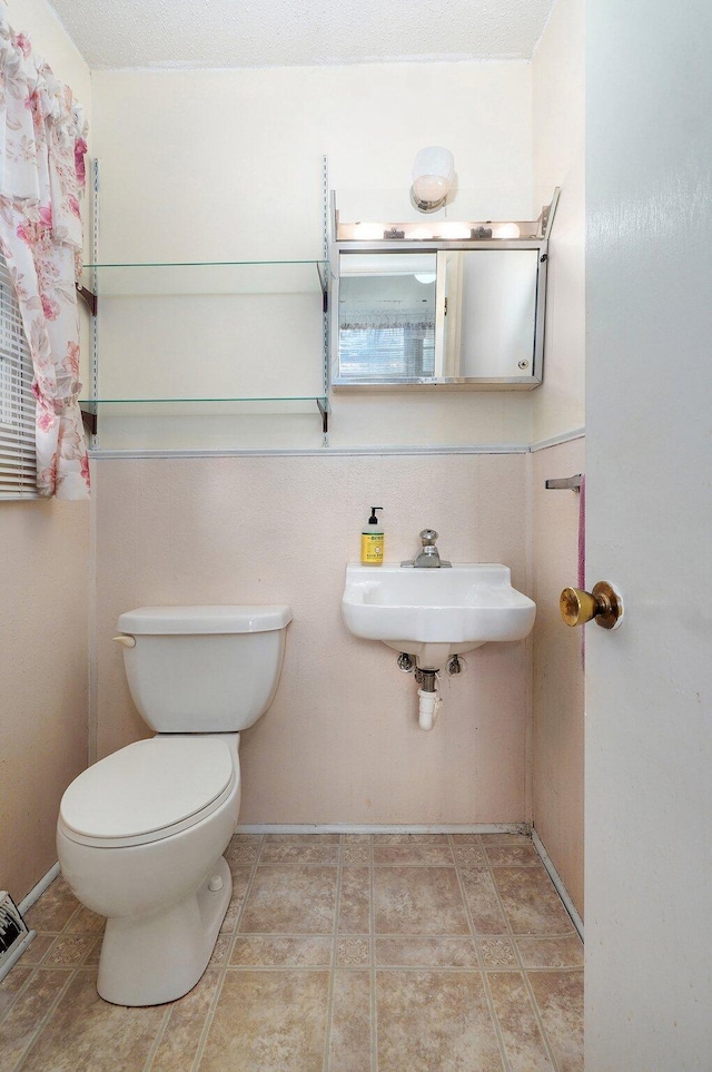 510 E College St, Walnut Grove, MO 65770 - half bath featuring toilet and a sink