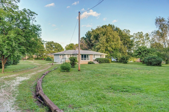 510 E College St, Walnut Grove, MO 65770 - view of grassy yard