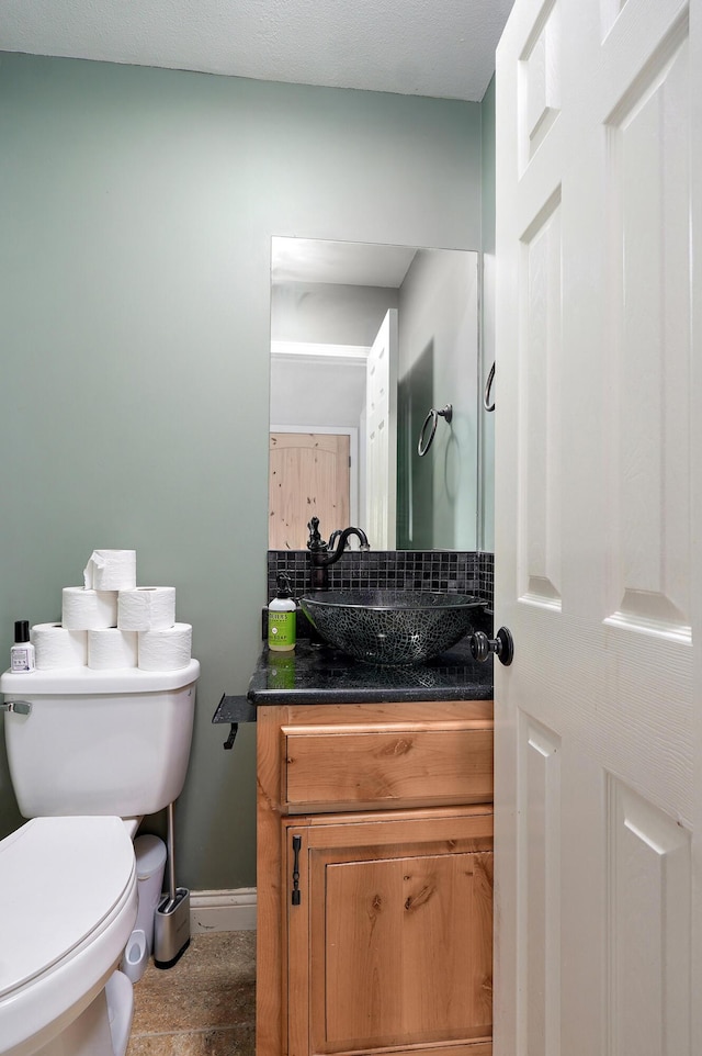 4402 Quail Run Rd, Ozark, MO 65721 - half bath with vanity, baseboards, and toilet