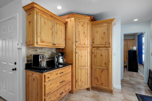 4402 Quail Run Rd, Ozark, MO 65721 - kitchen with dark countertops, freestanding refrigerator, tasteful backsplash, baseboards, and recessed lighting