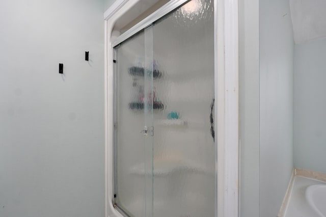 4402 Quail Run Rd, Ozark, MO 65721 - bathroom featuring a shower stall and a garden tub