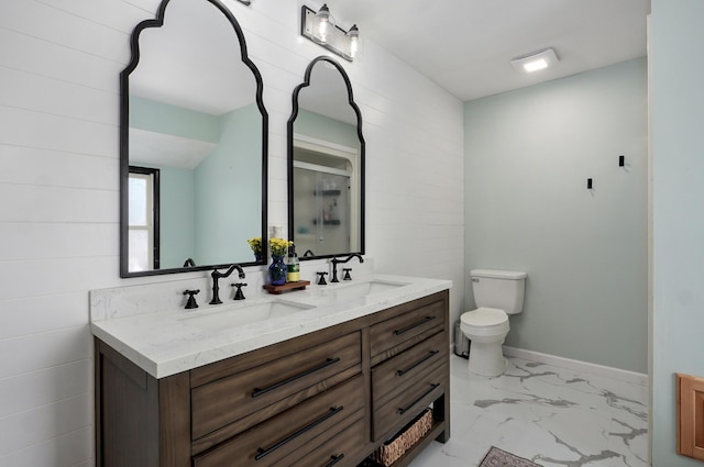 4402 Quail Run Rd, Ozark, MO 65721 - bathroom featuring marble finish flooring, double vanity, toilet, and a shower with door