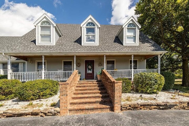 4402 Quail Run Rd, Ozark, MO 65721 - cape cod house with covered porch and roof with shingles