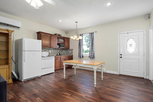 4402 Quail Run Rd, Ozark, MO 65721 - kitchen with white appliances, a baseboard heating unit, dark wood-type flooring, a sink, and recessed lighting