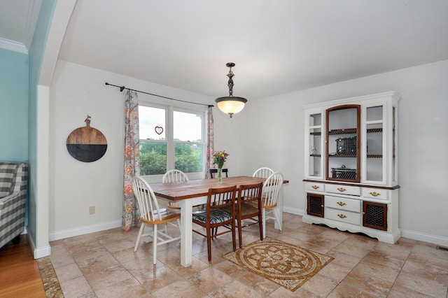 4402 Quail Run Rd, Ozark, MO 65721 - dining area featuring baseboards and light stone finish flooring