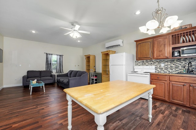 4402 Quail Run Rd, Ozark, MO 65721 - kitchen with white appliances, a wall mounted air conditioner, a sink, a ceiling fan, and dark wood finished floors