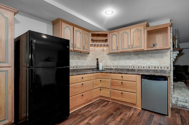 4402 Quail Run Rd, Ozark, MO 65721 - kitchen with freestanding refrigerator, fridge, decorative backsplash, and dark countertops