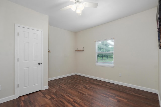 4402 Quail Run Rd, Ozark, MO 65721 - spare room with ceiling fan, dark wood finished floors, and baseboards