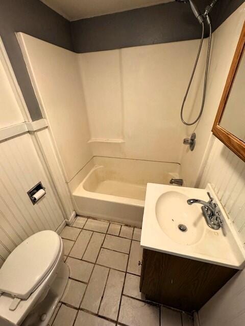 1211 W Calhoun St, Springfield, MO 65802 - bathroom featuring toilet, vanity, shower / bath combination, and tile patterned floors