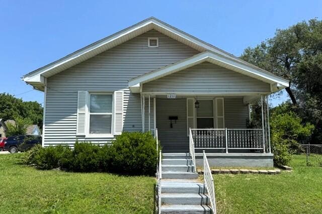 1211 W Calhoun St, Springfield, MO 65802 - bungalow-style house featuring a porch