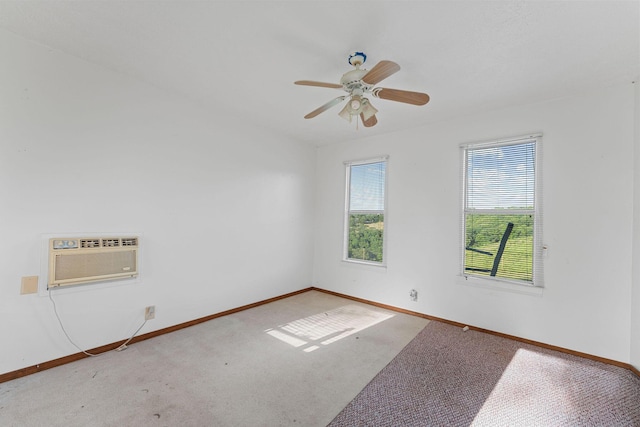 19326 Boat Dock Rd W, Omaha, AR 72662 - carpeted spare room with a wall mounted AC, baseboards, and ceiling fan