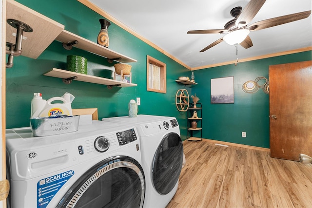 19326 Boat Dock Rd W, Omaha, AR 72662 - laundry area with washer and dryer, wood finished floors, ceiling fan, crown molding, and baseboards