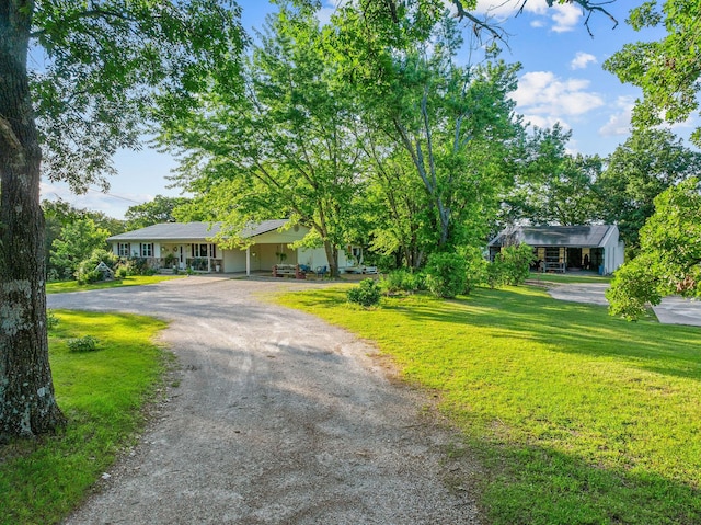 19326 Boat Dock Rd W, Omaha, AR 72662 - single story home with dirt driveway, a front yard, and covered porch