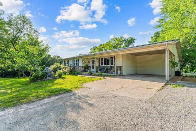 19326 Boat Dock Rd W, Omaha, AR 72662 - single story home with concrete driveway, a front yard, covered porch, and an attached carport