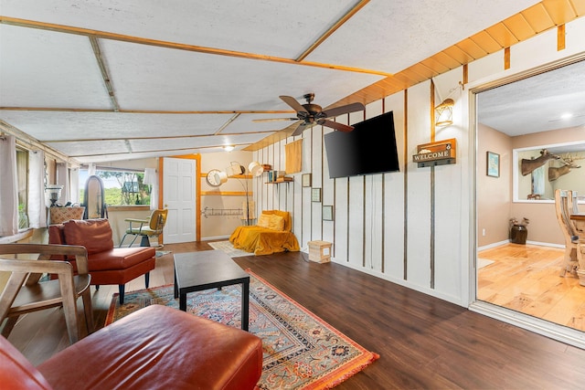 19326 Boat Dock Rd W, Omaha, AR 72662 - living room featuring a ceiling fan, wood finished floors, and baseboards
