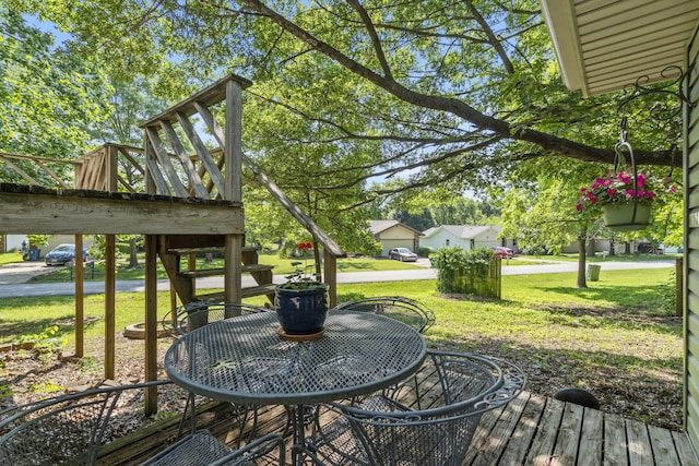 5527 S Honeysuckle Ln, Battlefield, MO 65619 - deck featuring a lawn