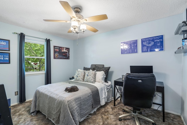 5527 S Honeysuckle Ln, Battlefield, MO 65619 - carpeted bedroom with a textured ceiling, an office area, a ceiling fan, and baseboards