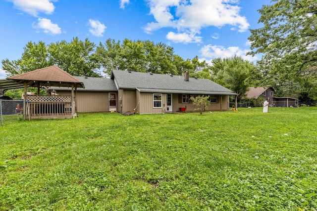 206 Plum St, Sparta, MO 65753 - rear view of house featuring a gazebo, a chimney, and a shingled roof