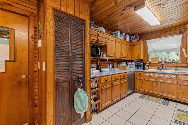 206 Plum St, Sparta, MO 65753 - kitchen with black microwave, a sink, stainless steel dishwasher, light tile patterned flooring, and light countertops