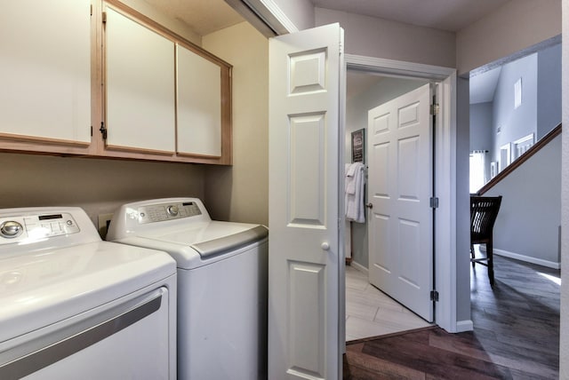 280 Wimbledon Dr Unit 9, Branson, MO 65616 - washroom with cabinet space, independent washer and dryer, light wood finished floors, and baseboards