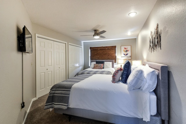 280 Wimbledon Dr Unit 9, Branson, MO 65616 - bedroom with two closets, carpet flooring, ceiling fan, and baseboards