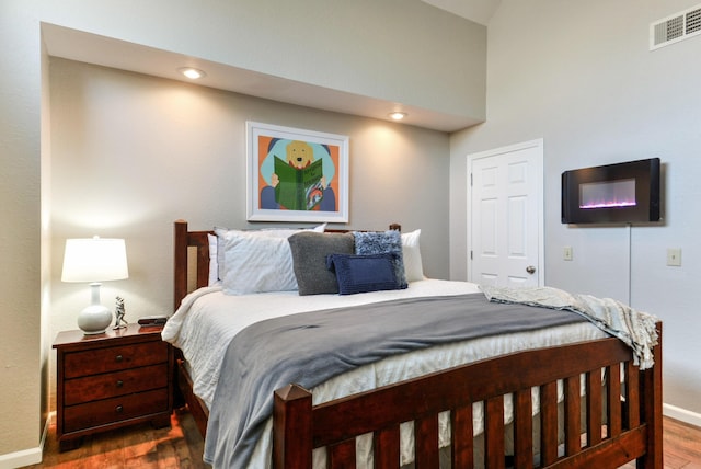 280 Wimbledon Dr Unit 9, Branson, MO 65616 - bedroom featuring wood finished floors, baseboards, and recessed lighting