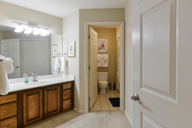 318 Wimbledon Dr Unit 8, Branson, MO 65616 - full bath with toilet, vanity, tile patterned floors, and baseboards