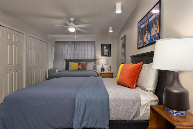 344 Wimbledon Dr Unit 7, Branson, MO 65616 - bedroom with two closets and ceiling fan