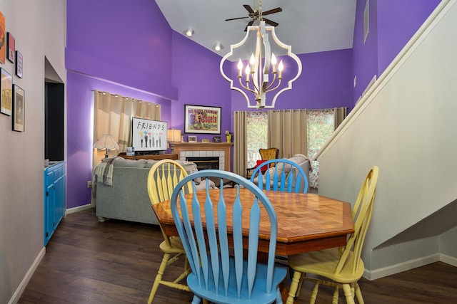 344 Wimbledon Dr Unit 7, Branson, MO 65616 - dining area with high vaulted ceiling, baseboards, a chandelier, wood finished floors, and ceiling fan