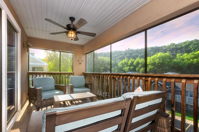 344 Wimbledon Dr Unit 7, Branson, MO 65616 - sunroom with a ceiling fan