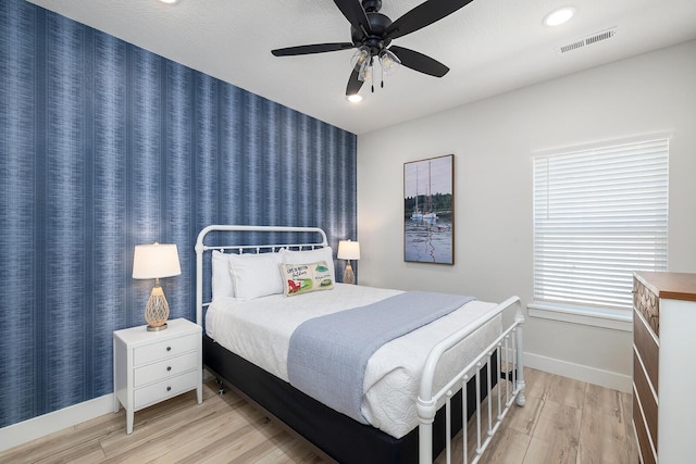 224 David Shawn Dr, Branson, MO 65616 - bedroom with wood finished floors, baseboards, recessed lighting, and ceiling fan