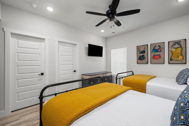 224 David Shawn Dr, Branson, MO 65616 - bedroom featuring light wood finished floors, recessed lighting, and ceiling fan