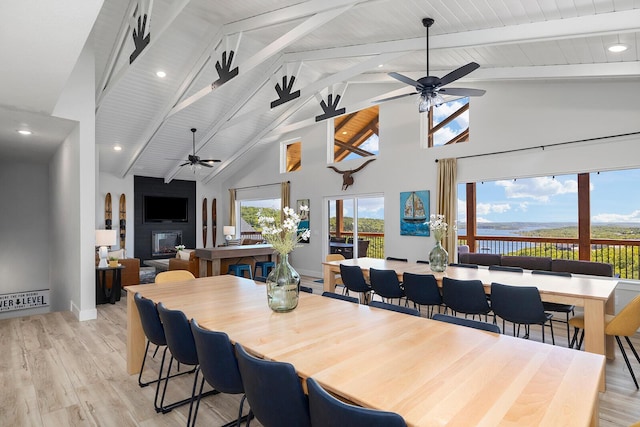 224 David Shawn Dr, Branson, MO 65616 - dining space featuring ceiling fan, high vaulted ceiling, light wood-type flooring, beam ceiling, and recessed lighting