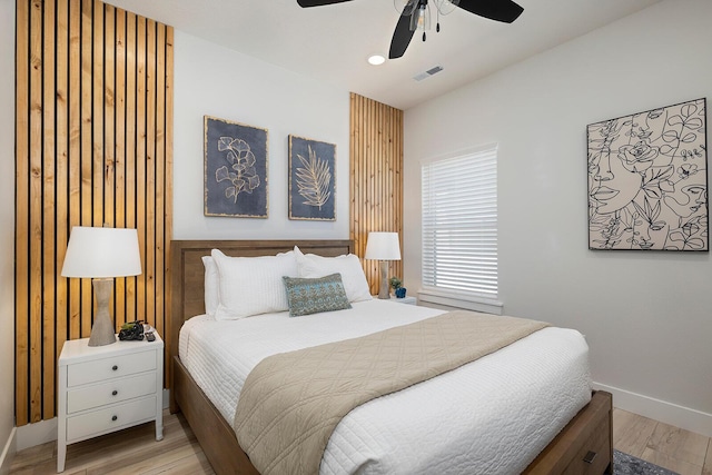 224 David Shawn Dr, Branson, MO 65616 - bedroom with light wood finished floors, baseboards, and ceiling fan