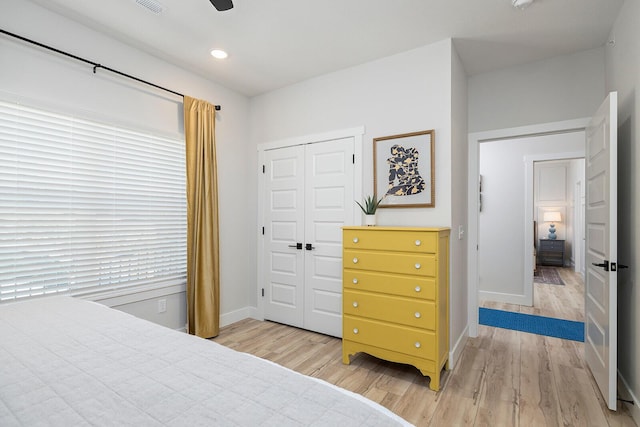 224 David Shawn Dr, Branson, MO 65616 - bedroom with light wood-style flooring, baseboards, a closet, a ceiling fan, and recessed lighting