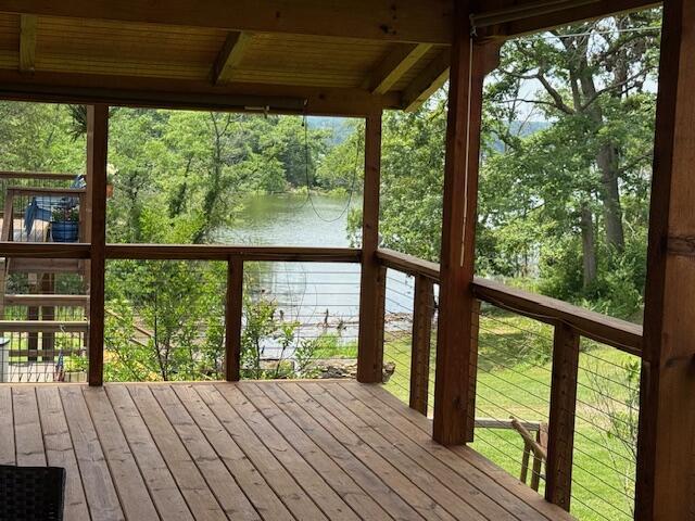 83 Dawn Cir, Galena, MO 65656 - wooden terrace with a water view and view of scattered trees