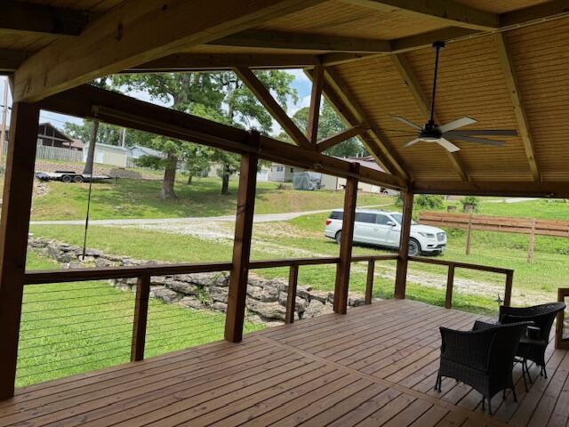 83 Dawn Cir, Galena, MO 65656 - wooden deck with a yard and ceiling fan