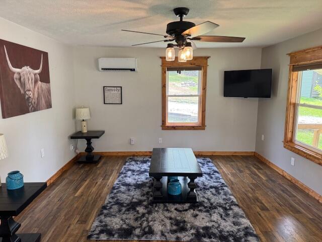 83 Dawn Cir, Galena, MO 65656 - living area with ceiling fan, plenty of natural light, and wood finished floors