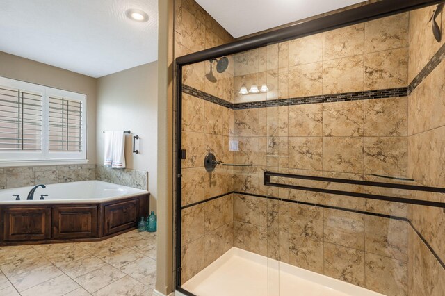 1002 S Joshua Ave, Republic, MO 65738 - full bathroom featuring a garden tub and a shower stall