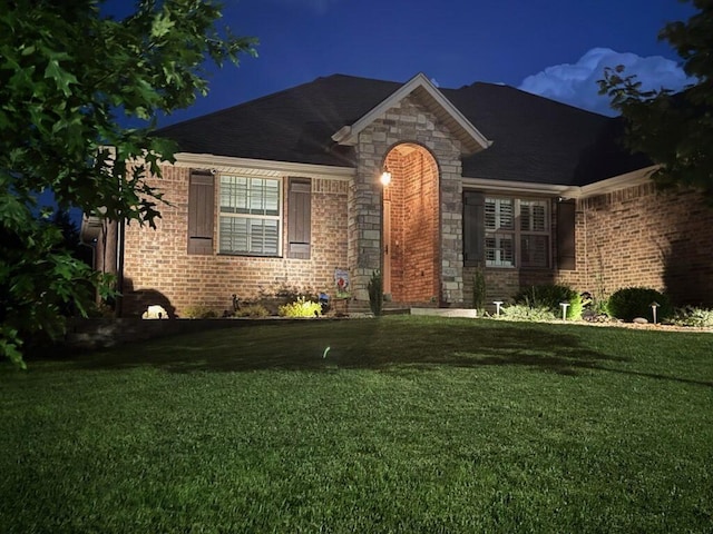 1002 S Joshua Ave, Republic, MO 65738 - ranch-style house featuring a front lawn, stone siding, and brick siding