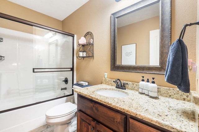 1002 S Joshua Ave, Republic, MO 65738 - full bath with vanity, toilet, shower / bath combination with glass door, and a textured wall