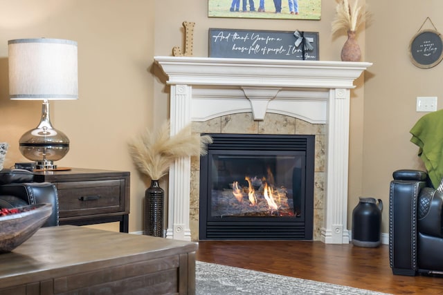 1002 S Joshua Ave, Republic, MO 65738 - detailed view of wood finished floors and a tile fireplace
